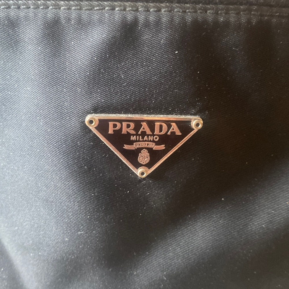 Needs some repair as shown. 9 X 4 black